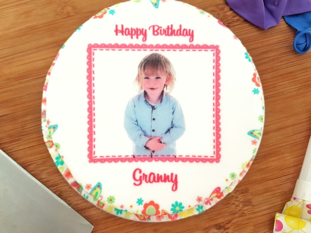 A close up birds eye view of a bakersday 5 inch cake