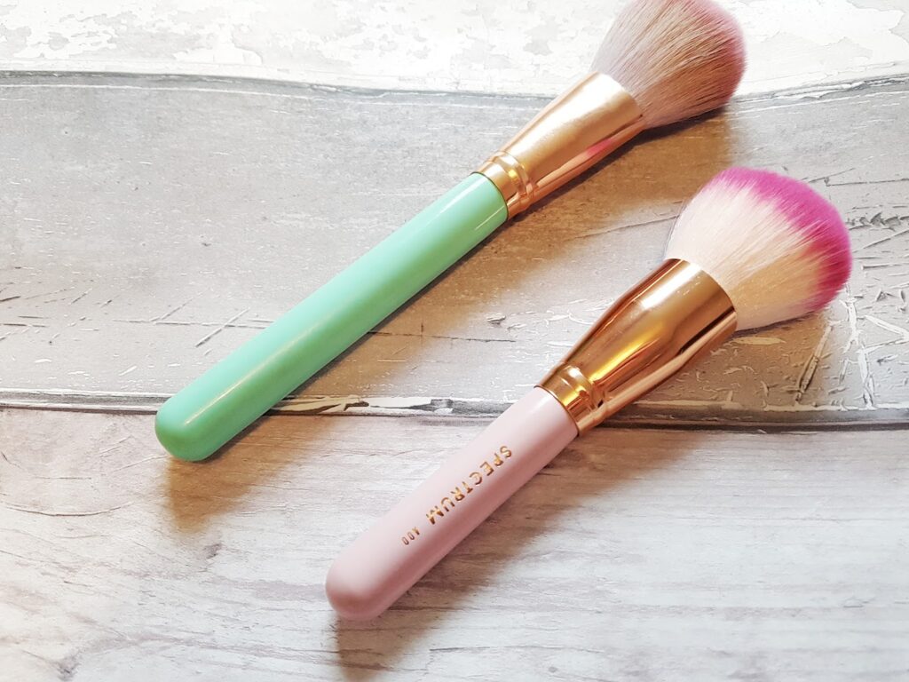 Close up of two spectrum collections make-up brushes