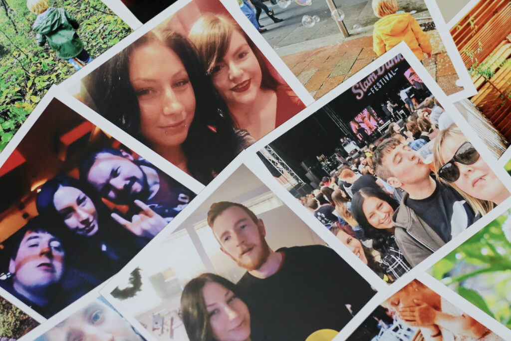 A flatlay photo of multiple photo prints of Ofaglasgowgirl family from Printiki