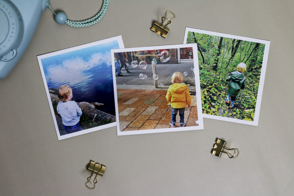 A flatlay photo of 3 photo prints of Ofaglasgowgirl family from Printiki