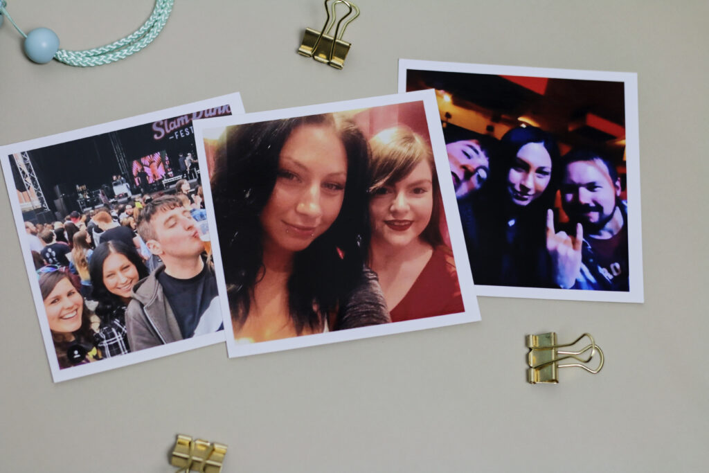 A flatlay photo of 3 photo prints of Ofaglasgowgirl freinds from Printiki