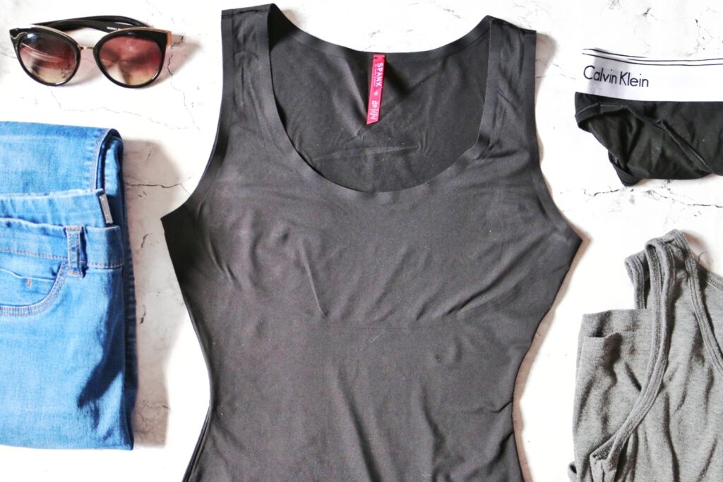 Spanx Thinstincts Tank Top review on thelifeofaglasgowgirl.co.uk Birds eye view of the Spanx Thinstincts Tank Top on a marble background