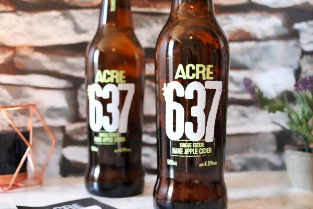 Extreme close up photo of ACRE Rare apple Cider bottle