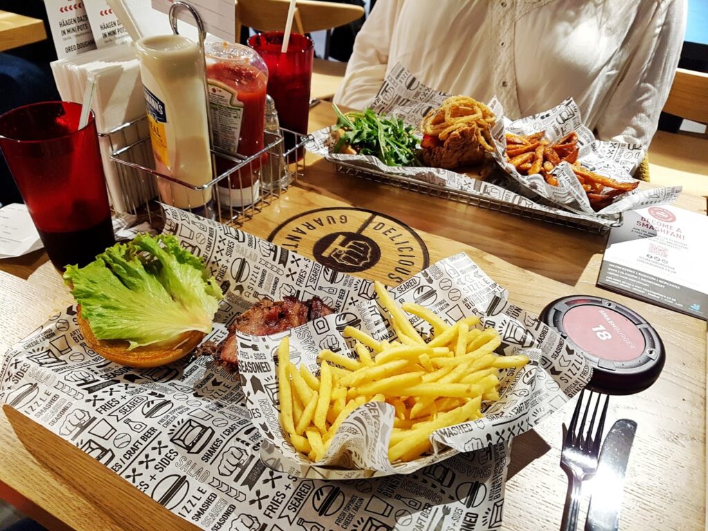 Close up photo taken by Ofaglasgowgirl of two meals from Smashburger