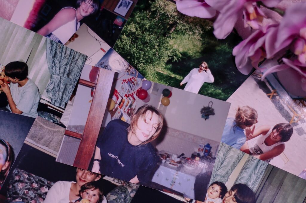Coping with the Death of My Mother - Birds eye view of old photographs on the floor