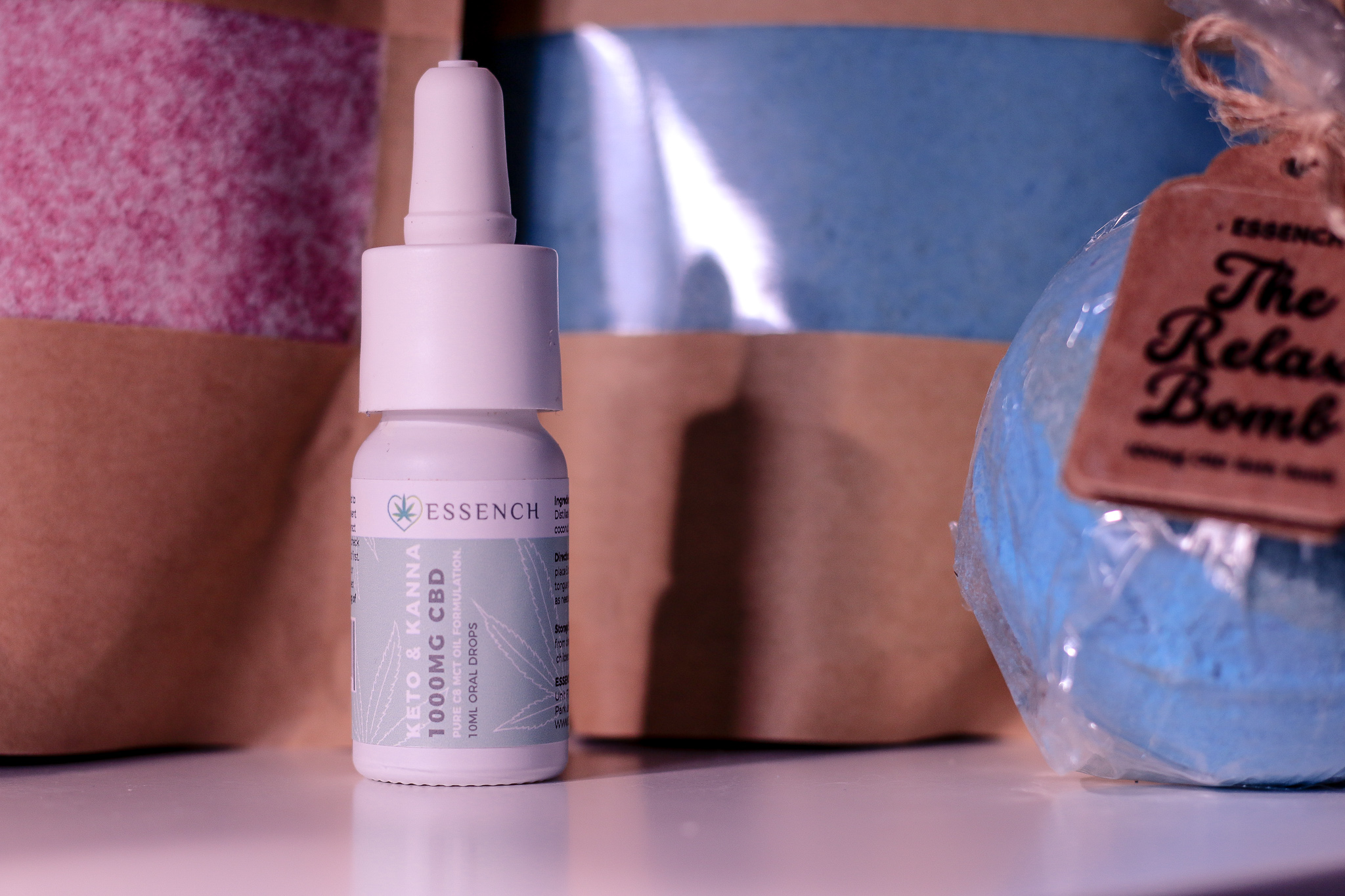 National Women's Health and Fitness day with ESSENCH Close up photo of the Keto and Kanna 1000MG CBD oil from ESSENCH