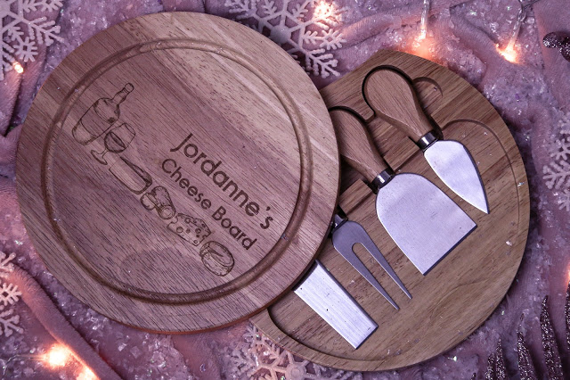 Birds eye photo of the round personalise cheese board and knife set from Always personal