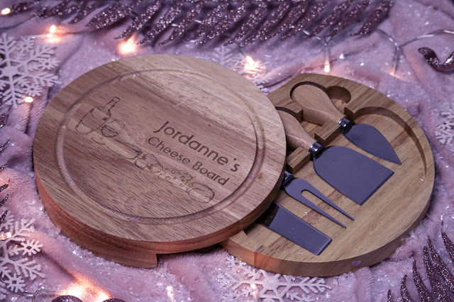 Birds eye photo of the round personalise cheese board and knife set from Always personal