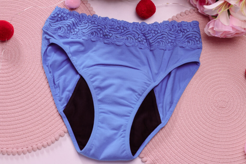 Birds eye photo of blue Sensual Hi-Waist Bikini Modibodi period and leak proof underwear