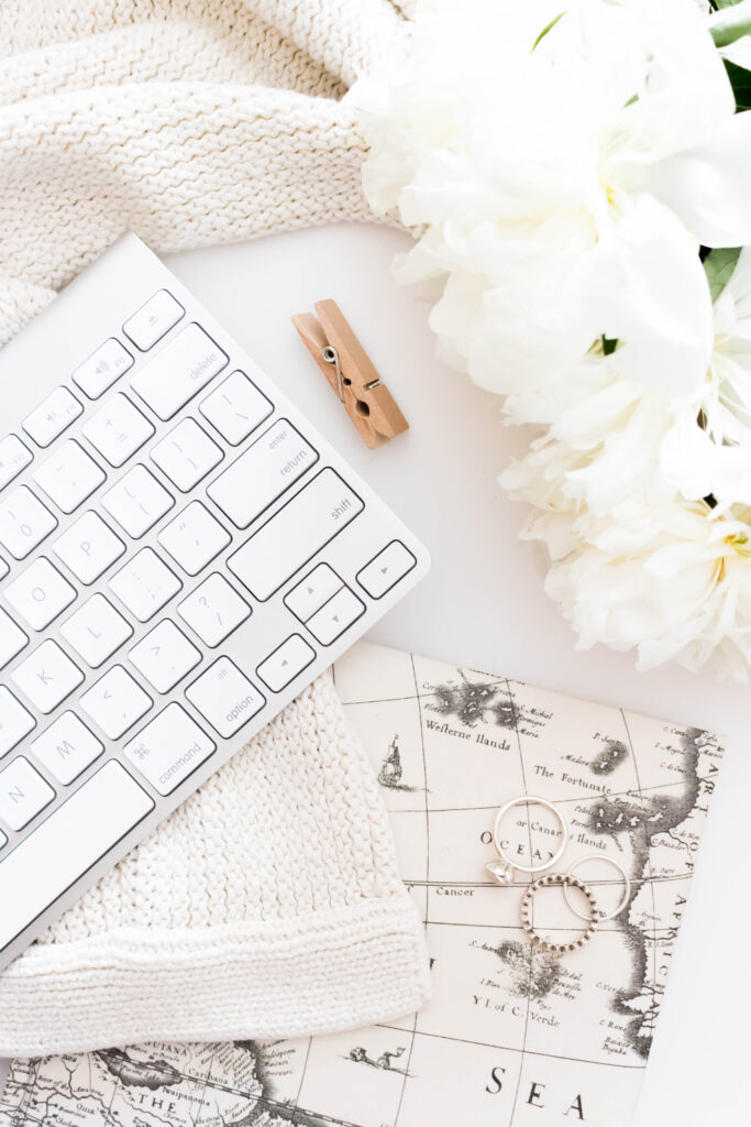 An Extensive List of Resources For Bloggers - Stock photo from Grill boss stock images of a silver keyboard on a white desk with white flowers and some rings