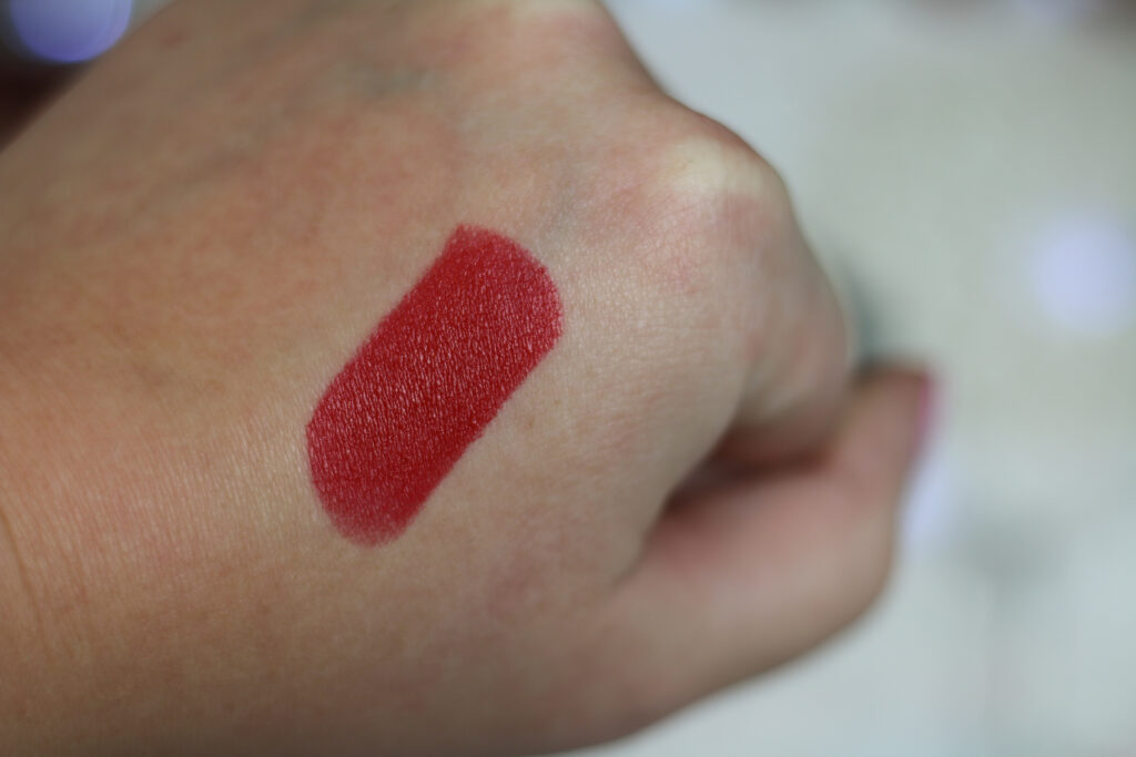 Extreme close up of a swatch of Colour Me Beautiful lipstick Red Velvet