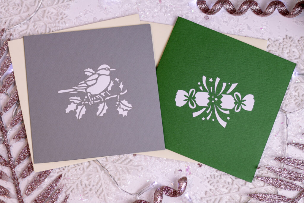 Birdseye view of two cards from Pop-Up Pigeon