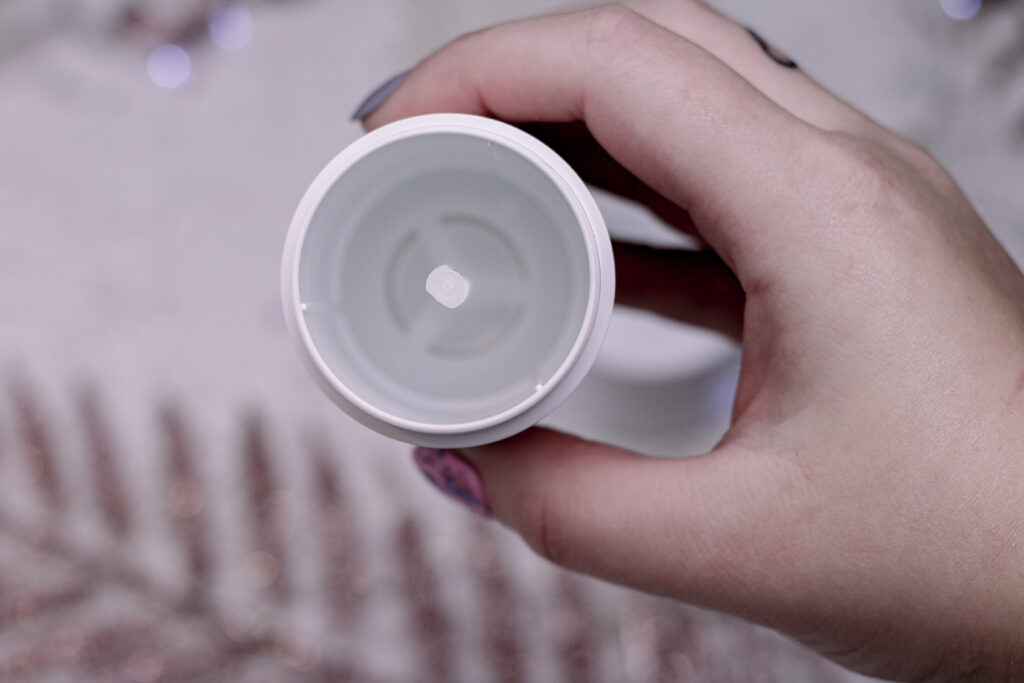 Close up photo of Jordanne holding the Proverb deodorant refill case