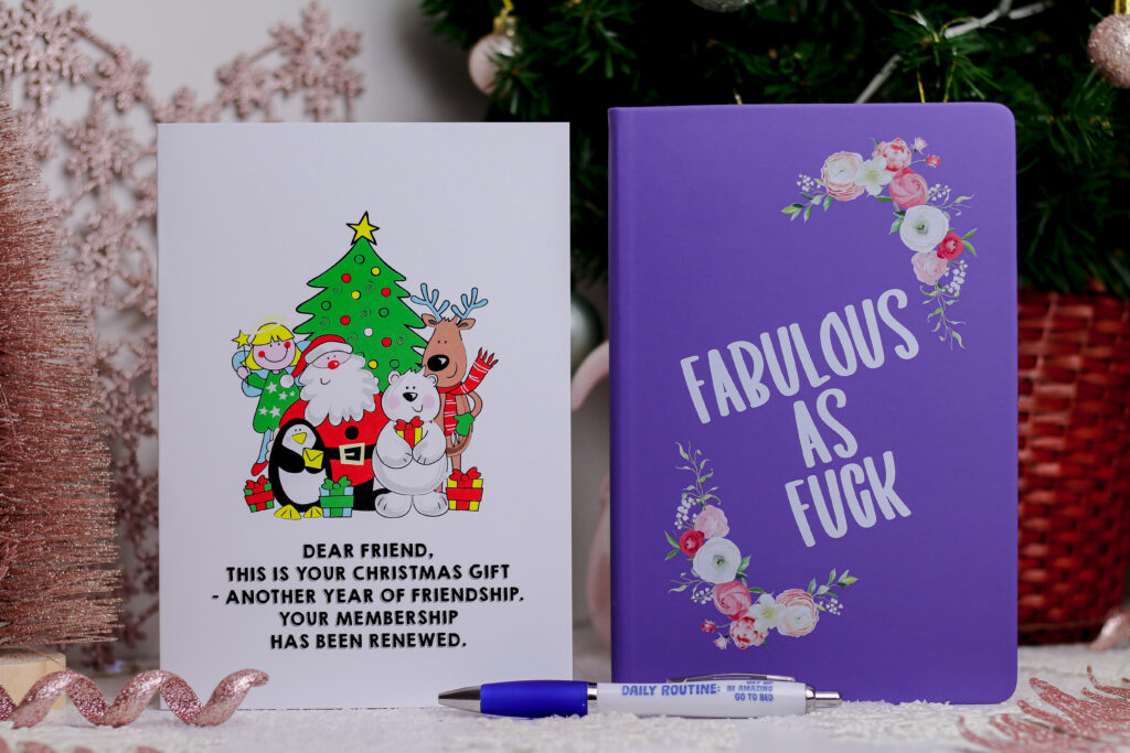 Close up of a card and notebook from Love Layla