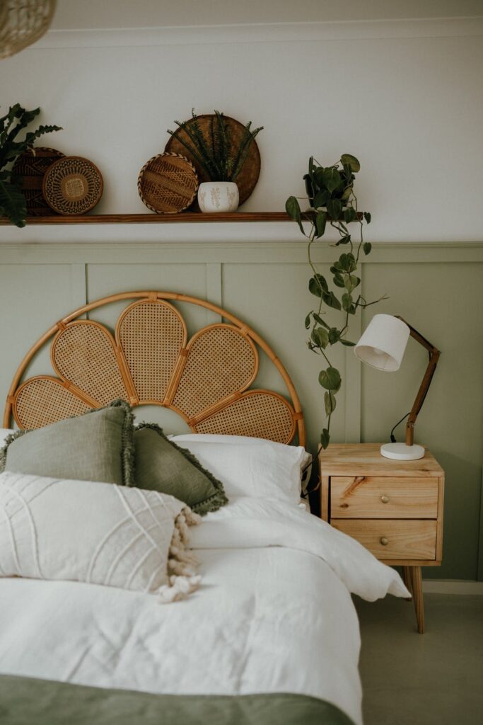 Home DIY Trends - Wall Panels stock photo from pexels by Taryn Elliott of a wooden bed against a sage gree wooden panelled wall
