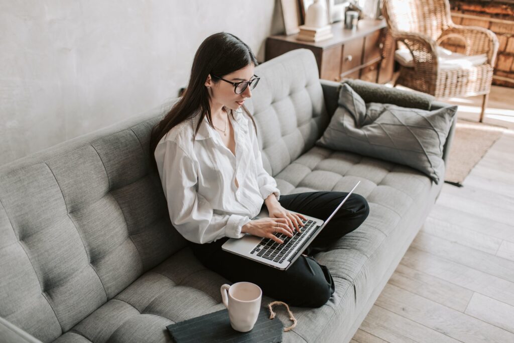Stock photo from pexels by Vlada Karpovich of a Woman Working At Home Using Laptop
