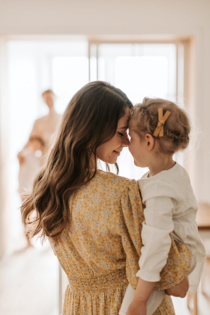 Stock photo from Pexels by Vlada Karpovich of Mother and Daughter Rubbing Their Noses Against Each Other
