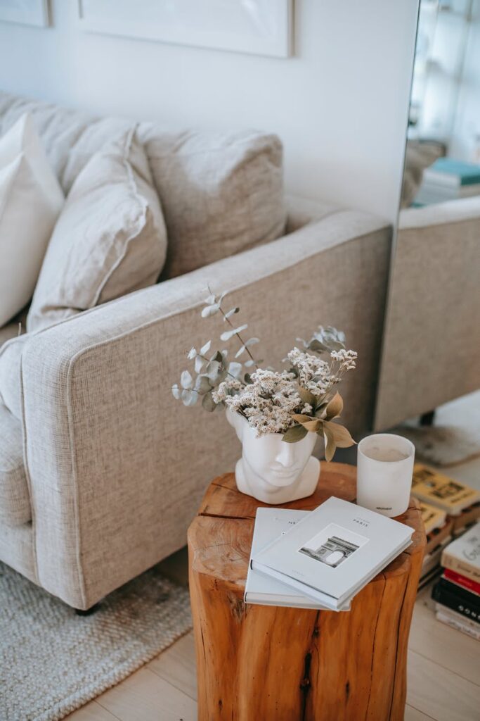 Stock photo from Pexels by Charlotte May of home Living room interior with furniture and flowers in vase