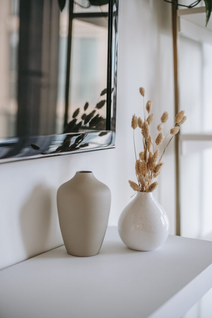 Stock photo from Pexels by Charlotte May of a home living room with dried flowers in vase