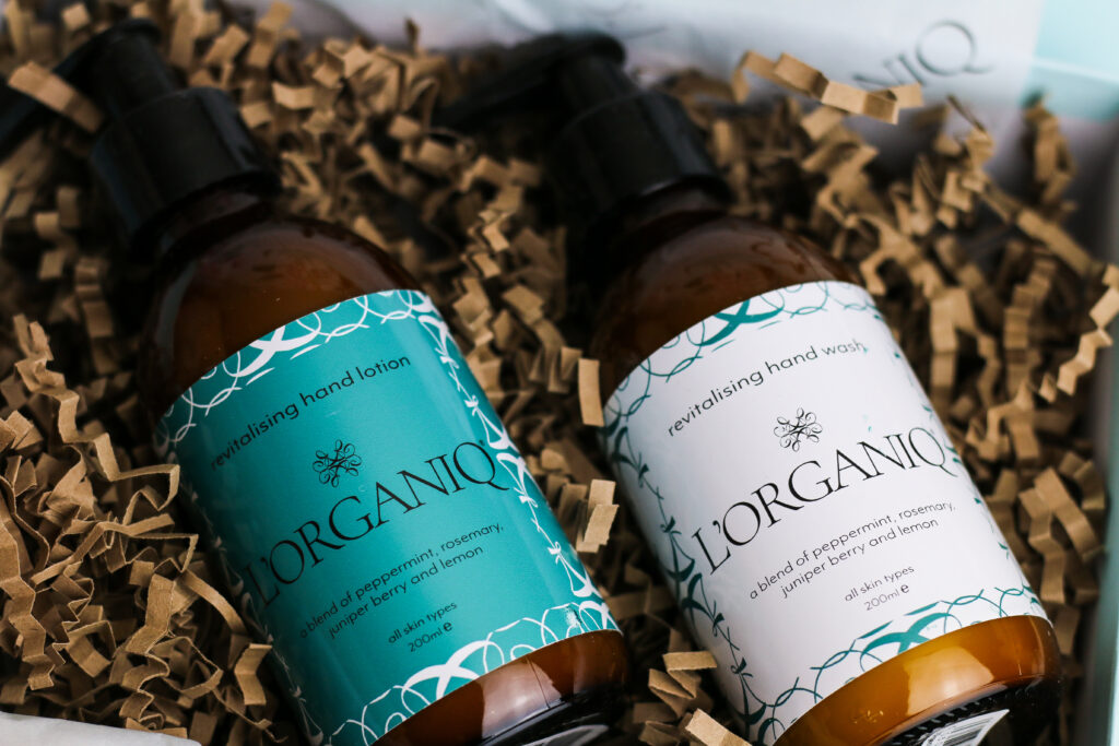 Close up of Revitalising Hand Wash and Revitalising Hand Lotion from L'ORGANIQ in a gift box