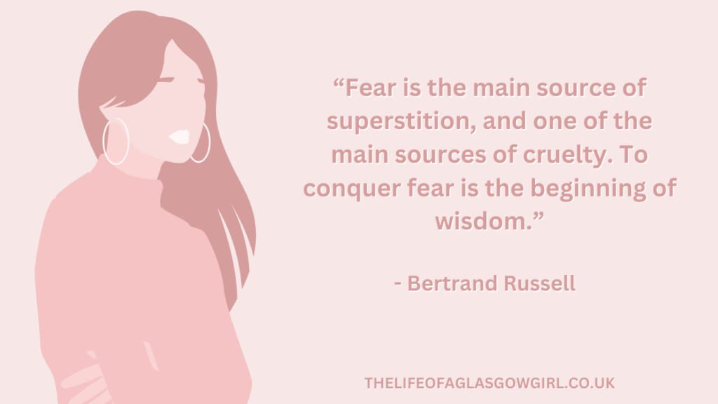 Pink graphic with dark pink text that reads a quote by Bertrand Russell โFear is the main source of superstition, and one of the main sources of cruelty. To conquer fear is the beginning of wisdom.โ