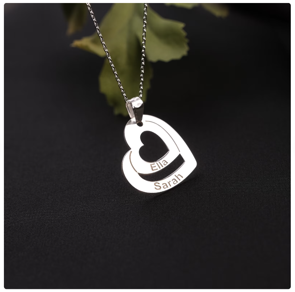 Photo of a personalised heart necklace by TheThamesUK on Etsy