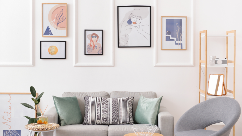 Stock photo from Canva by Pixelshot of a living room with a bright pastel gallery wall