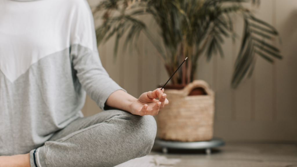 Stock photo from Canva by Vlada Karpovich of a woman meditating