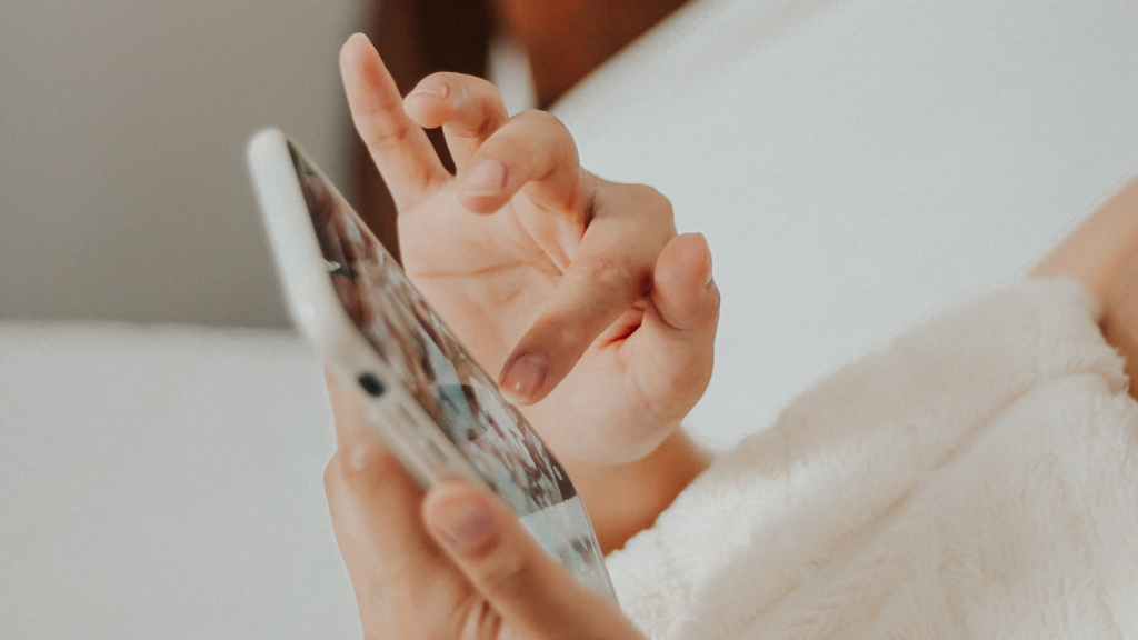 Stock photo from Canva by Jazmin Tabuena of a Woman Using Phone