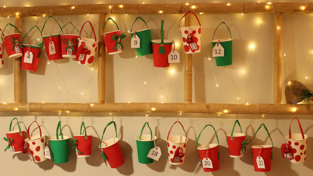 Stock photo from Canva by pixelshot of a hanging cup Advent Calendar on a wall