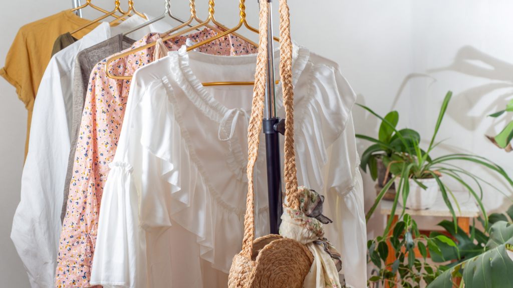 Stock photo from Canva of lightweight summer clothing for a woman on a rack