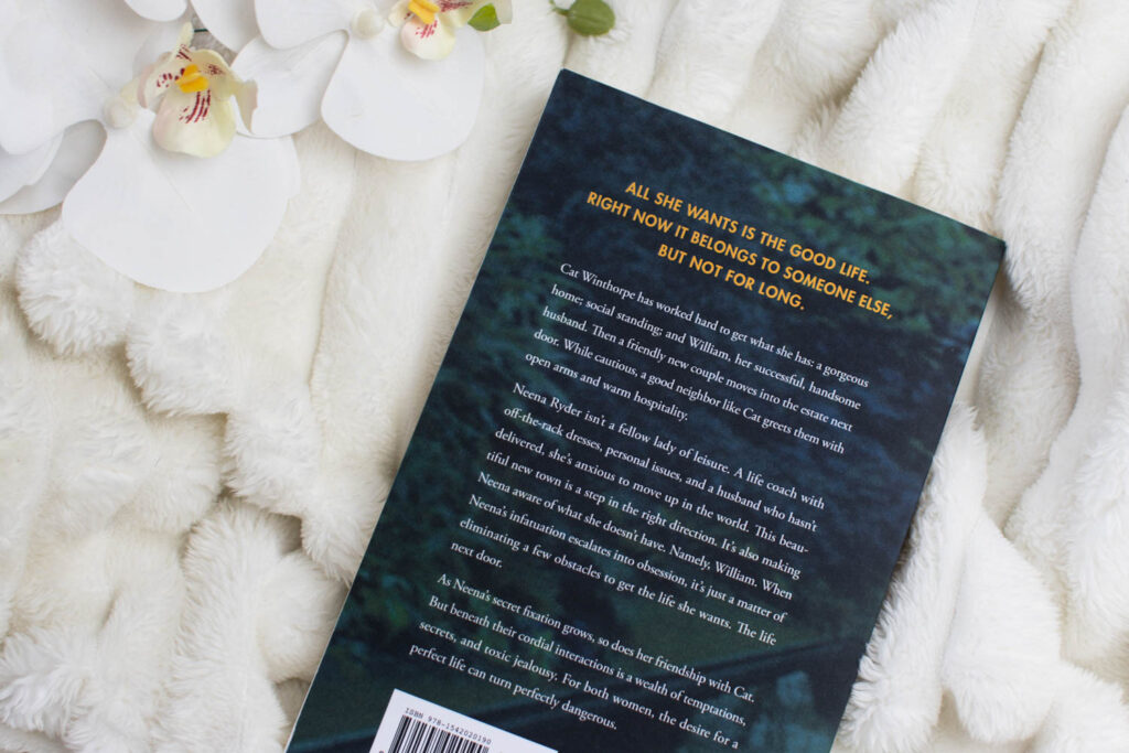 Bird's-eye view photo of The back of the Every Last Secret Book on a white throw, taken by Jordanne / Ofaglasgowgirl