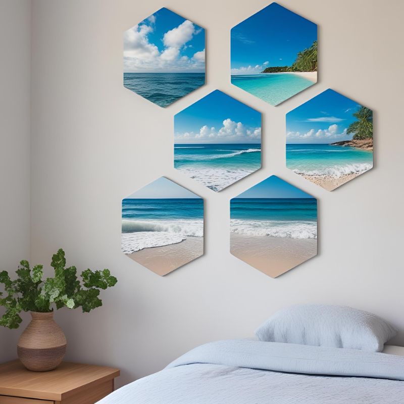 Stock photo from Canva of a wall with Hexagon photo tiles that have views of the ocean and beach on them
